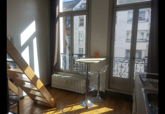 Studio mezzanine balcon centre